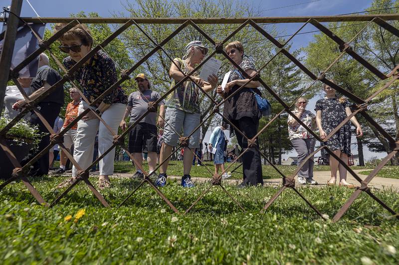 A nine foot section of sidewalk railing sits on display from the Truesdell Bridge Sunday, May 7, 2023 during a ceremony marking the 150th anniversary of the bridge collapse.