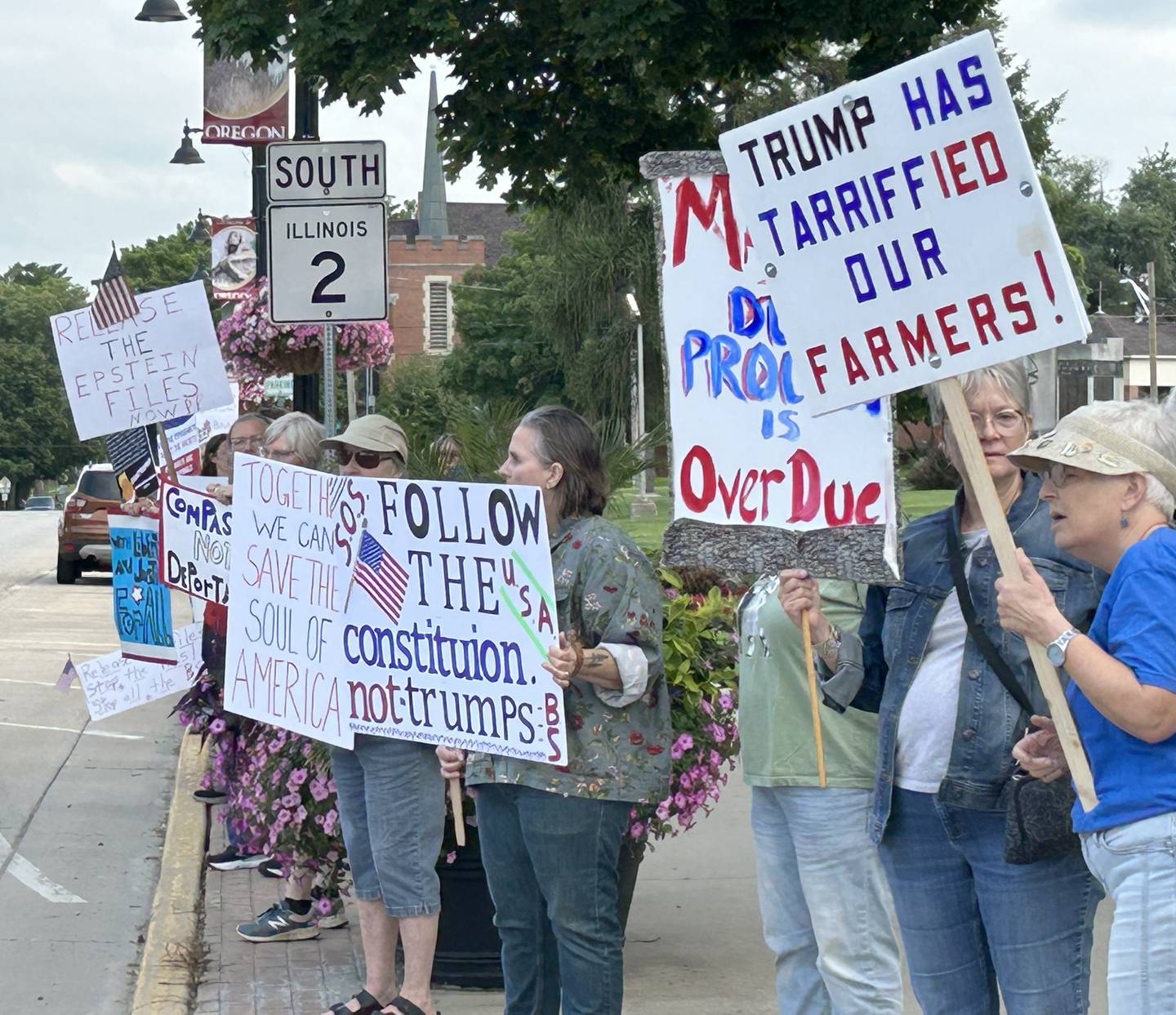 Around 75 people took part in Indivisible of Oregon's "Good Trouble Lives On" rally around the Ogle County courthouse in downtown Oregon on Thursday, July 17, 2025. The event was the fifth held to protest ongoing policies and executive orders by President Trump and his administration.