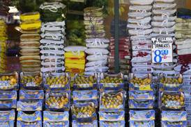 Inflation rose slightly last month as grocery prices ticked higher