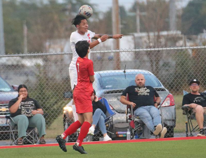 Ottawa's Jorge Lopez puts a header on the ball against L-P's Adrian Gonzalez on Monday, Oct. 6, 2025 at the L-P Athletic Complex in La Salle.