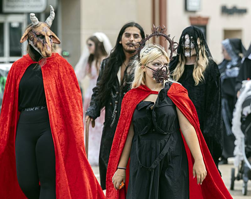 Members of Haunted Haven scare up some fun while marching through the Fiesta Days parade Saturday, Sept. 16, 2023.