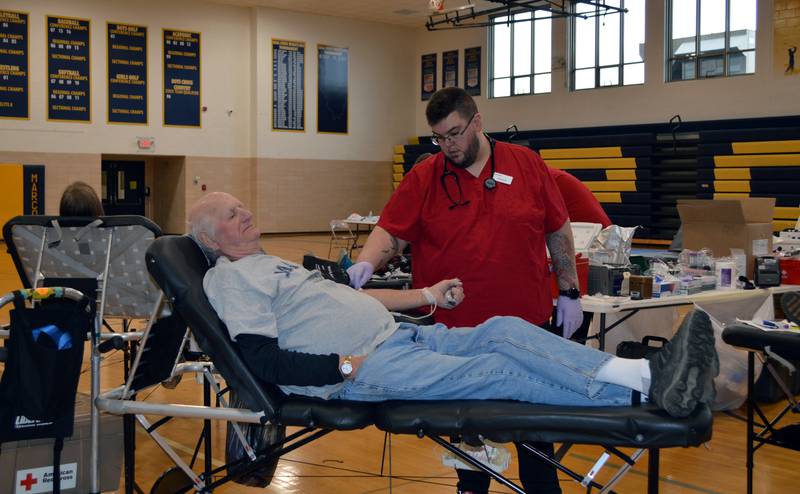 American Red Cross worker Corey Kepper prepares Ken Nettz, of Polo, to donate blood on April 28 in the Polo Community High School gym. The Polo Student Council hosted the blood drive with the American Red Cross.