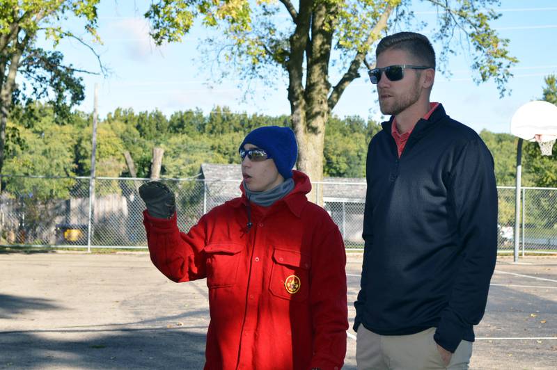 Gab Buelvas, 17, of Dixon, left, explains to Dixon Park District Recreation Director Seth Nicklaus where he and his team of about 15 volunteers are at in the construction of a gaga ball pit for Vaile Park on Saturday, Oct. 7, 2023. The gaga ball pit was Buelvas' Eagle Scout project.