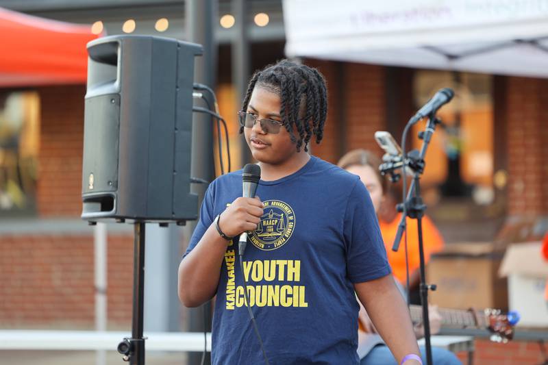 Emery Hamilton, 13, president of the Kankakee NAACP Youth Council, speaks to a crowd of approximately 100 people at the conclusion of the 2nd Walk Against Gun Violence in Kankakee on Tuesday, April 29, 2025.