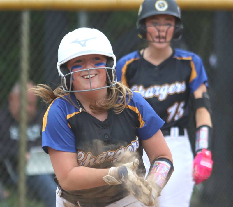 Aurora Central Catholic’s Meghan Buckley is all smiles after scoring against Marengo in varsity girls softball IHSA Class 2A Regional Title Game action on Friday, May 22, 2026 at Raymond Benoy Field on the campus of Marian Central High School in Woodstock.
