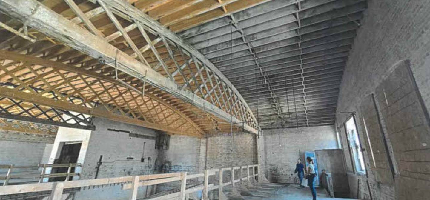 An inspection team completes a walk- through of the second floor of the garage at the Kaskaskia Hotel to look for any safety or structural concerns on June 16, 2022.