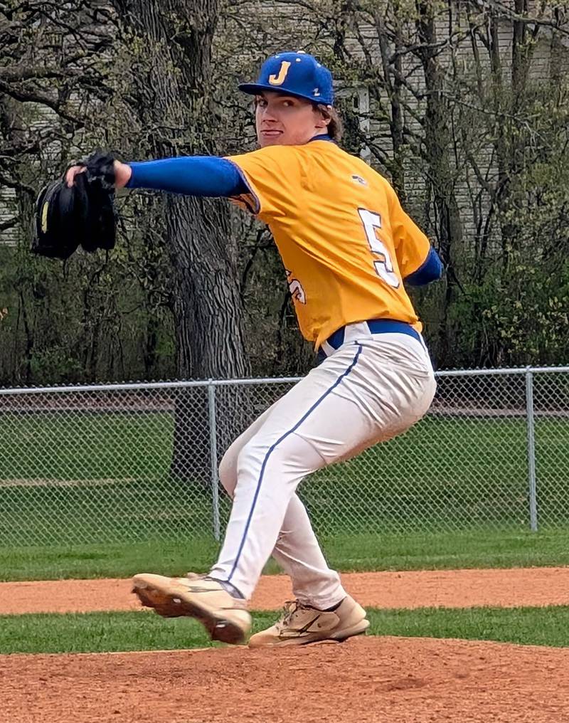 Johnsburg's Peyton Mesce delivers to the plate against Woodstock on Wednesday, April 30, 2025, at Emricson Park in Woodstock.