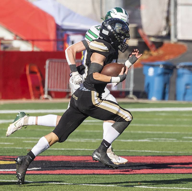 Lena-Winslow’s Alec Schlichting heads for the end zone for a TD against Brown County Friday, Nov. 28, 2025, in the Class 1A football finals at Hancock Stadium at ISU.