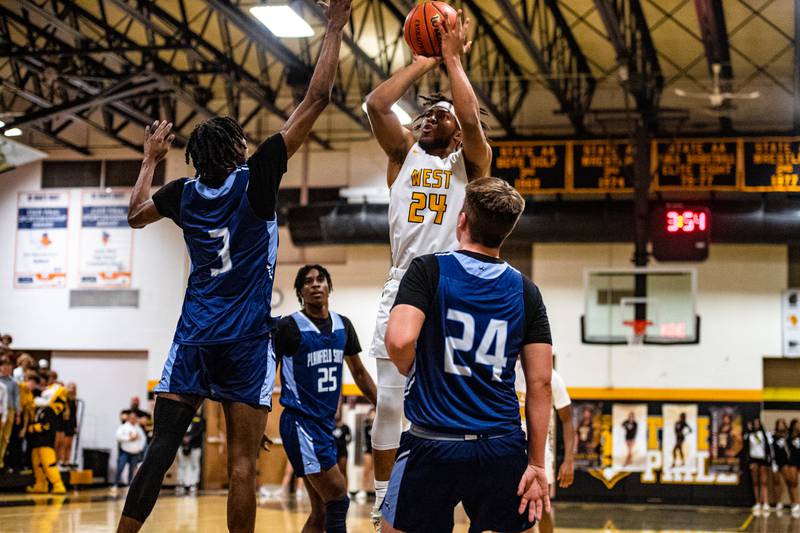 Joliet West's Jayden Martin puts up a shot during a game against Plainfield South Tuesday Feb. 14, 2023 at Joliet West  High School