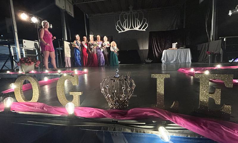 Winners of the 2024 Ogle County Fair Pageant line up for photos under the direction of pageant director Katelyn Boomgarden (far left) on Wednesday, July 31, 2024.