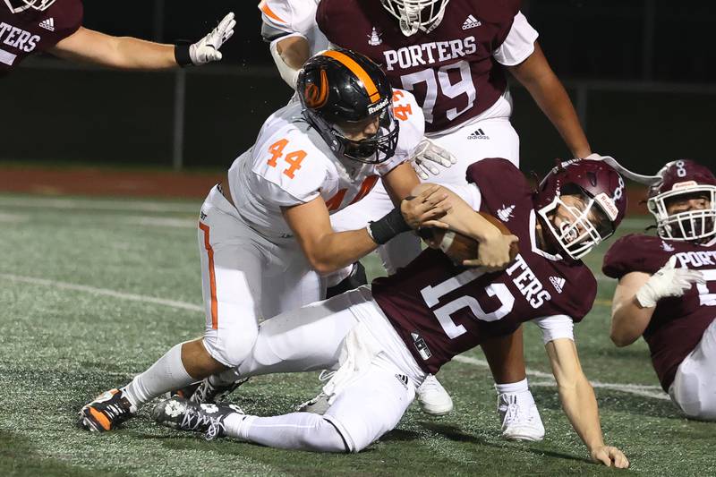 Lincoln-Way West’s Nathan Elstner sacks Lockport’s Brendan Mecher on Friday, Oct. 18, 2024 in Lockport.