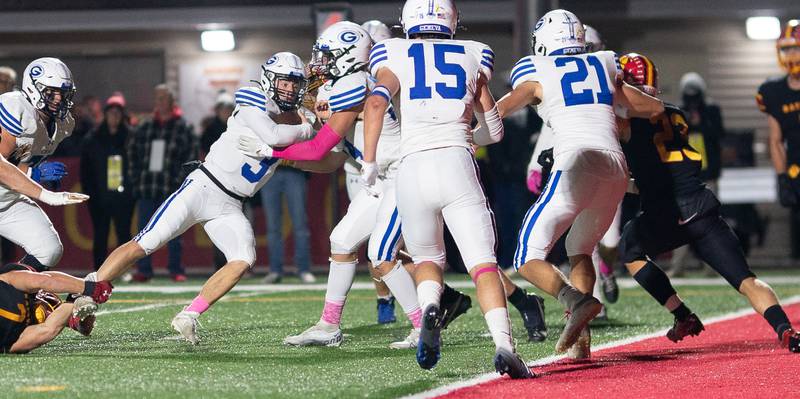 Geneva’s Nate Stempowski (3) carries the ball in for a score against Batavia during a football game at Batavia High School on Friday, Oct 7, 2022.