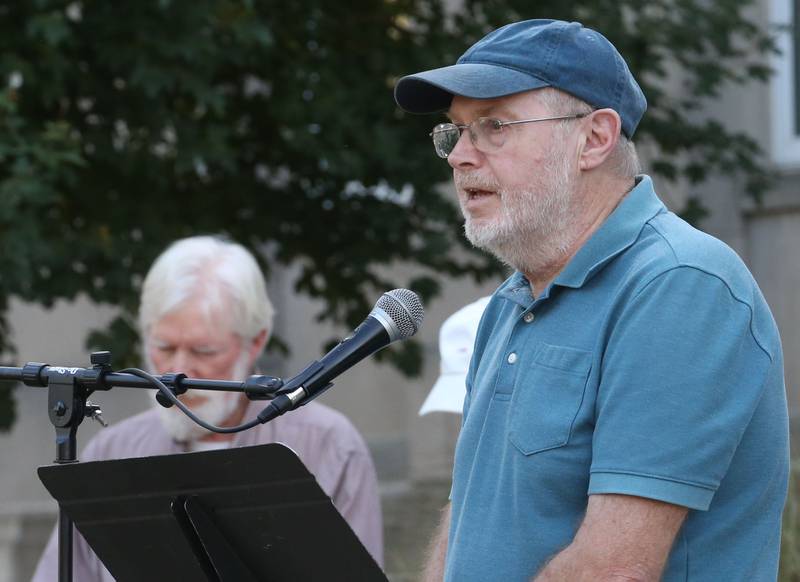Ted Roberts speaks during a vigil for Charlie Kirk on the front steps of the Bureau County Courthouse on Monday, Sept. 15, 2025 in Princeton. Around 200 people attended the vigil.
