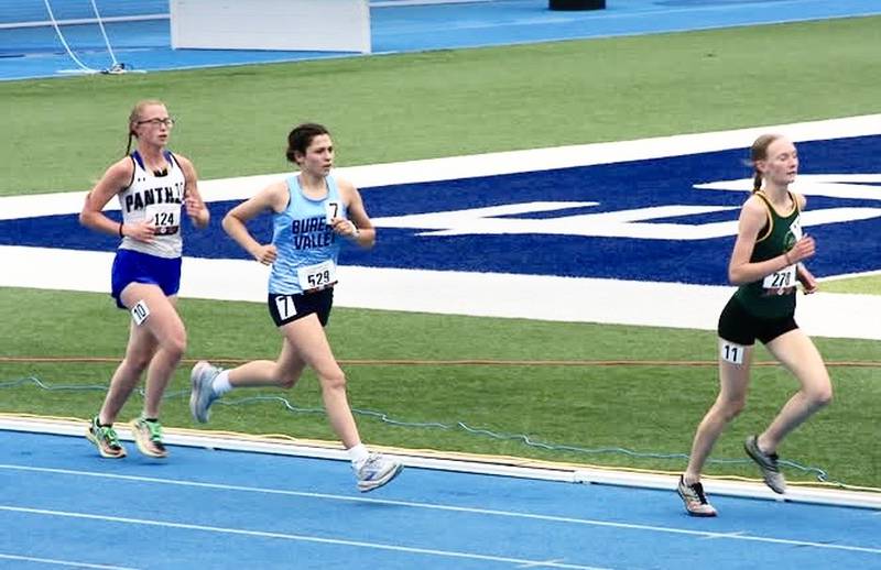 Bureau Valley senior Maddie Wetzell (7) runs in Saturday's 3,200 finals in the IHSA Class 1A State Track & Field Meet in Charleston.