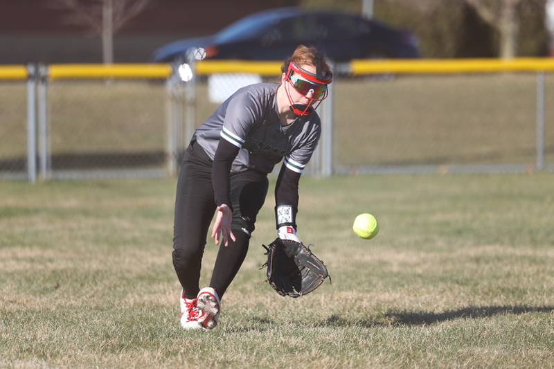 Plainfield Central’s Ava Sommerfeld fields the ball against Bolingbrook on Wednesday, March 20, 2024.