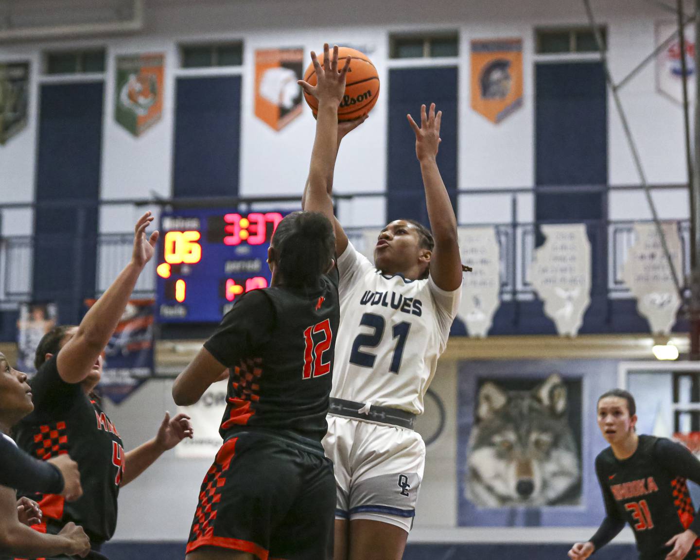 Oswego East's Desiree Merritt (21) rises for a jump shot during their basketball game between Minooka at Oswego East Friday, Jan 16, 2026 in Oswego.