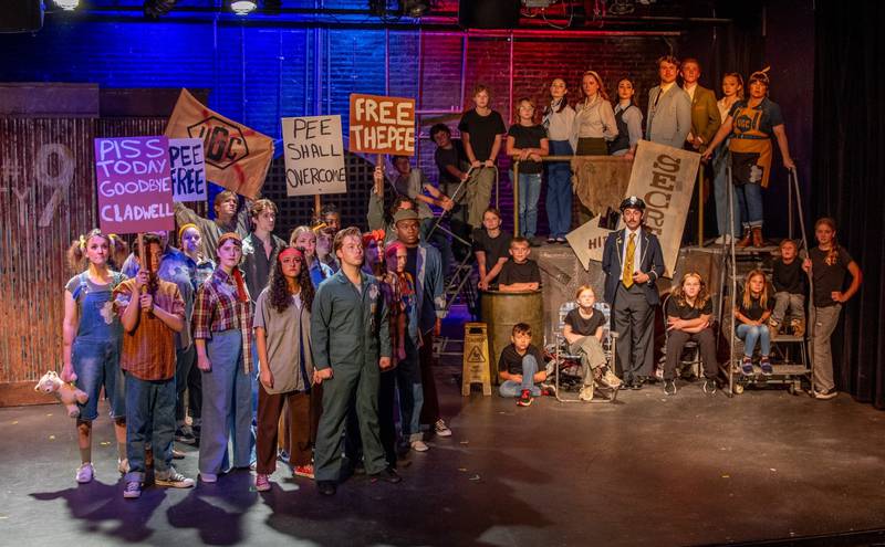 Youth Cast in rehearsal with the 2024 Professional Urinetown Cast.