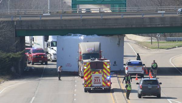Photos: Semi truck collides with Illinois Route 251 overpass