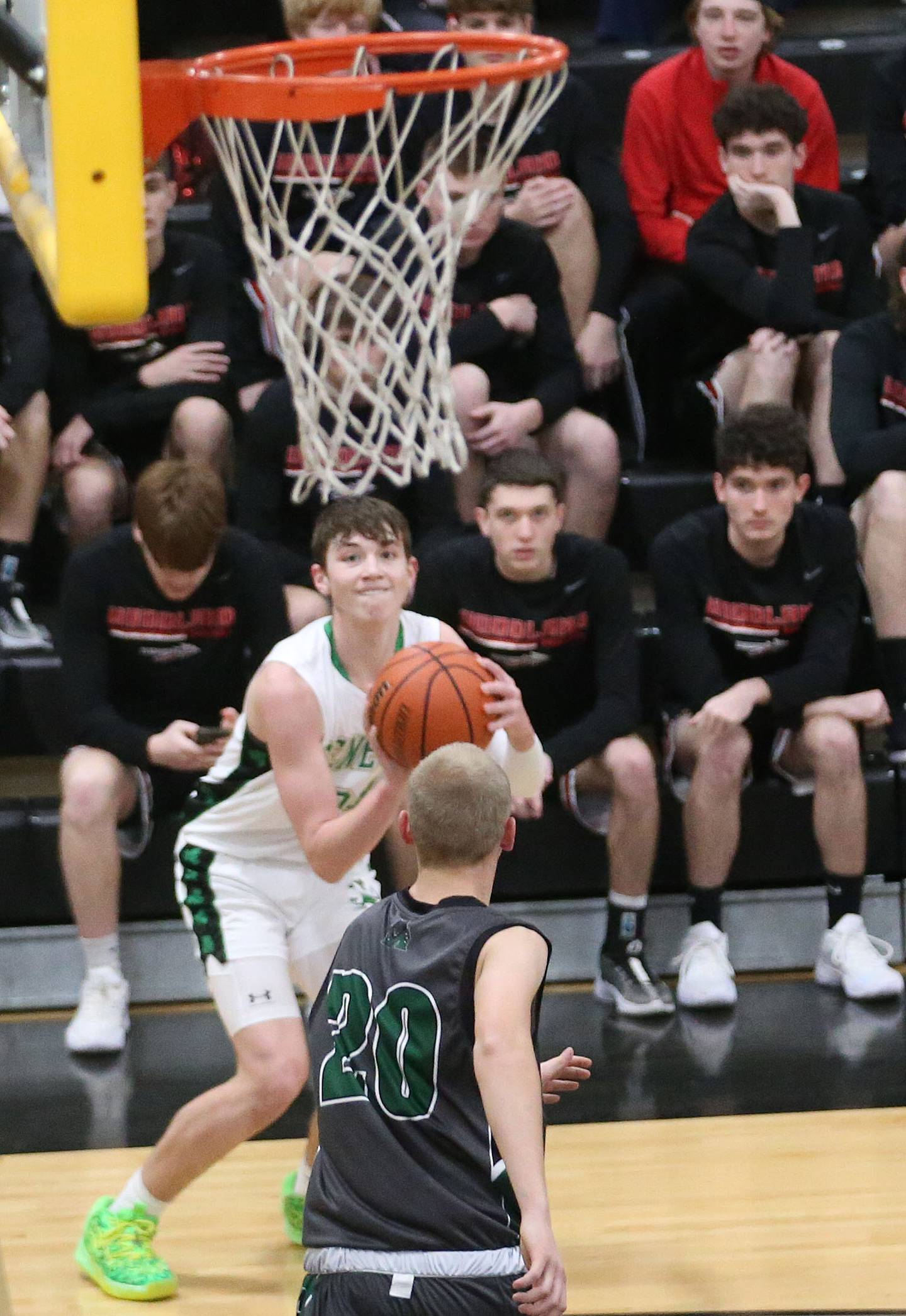 Seneca's Brady Sheedy looks to shoot a shot over Midland's Jacob Spicer during the Tri-County Conference Tournament last season at Putnam County High School.