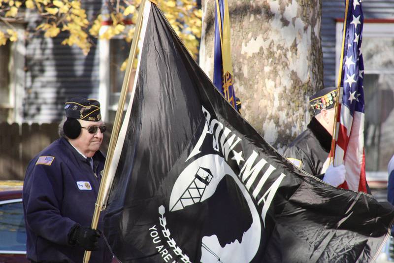 The POW/MIA banner is unfurled during a Veterans Day ceremony Friday, Nov. 11, 2022, at Veterans Memorial Park in Rock Falls.