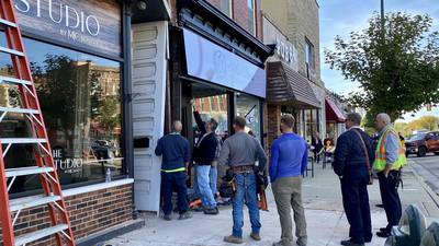 Two injured after Jeep crashes into downtown Sycamore building
