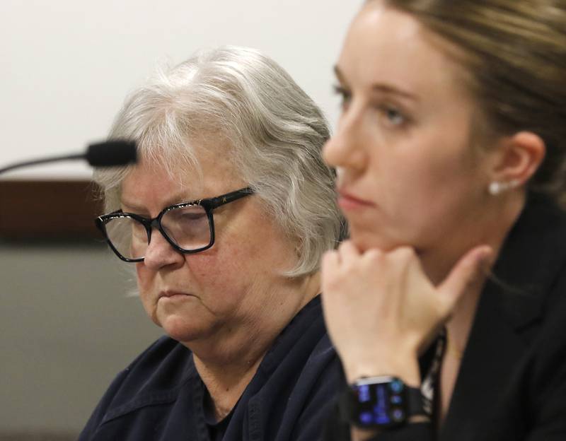 Roxanna L. Collins, 70, of McHenry, listens to court proceedings next to defense attorney Jennifer Recktenwald on Tuesday, June 3, 2025, during Collins’ initial appearance before Kenosha County Court Commissioner William Michel. She was charged with first-degree intentional homicide in the 2003 death of her husband, David Vanderzee.