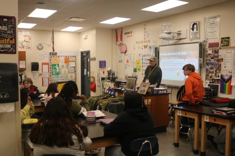 Edward Higgins, a Vietnam War veteran from Rockford, gives a talk on Monday, Nov. 10, 2025, to students at Clinton Rosette Middle School in DeKalb.