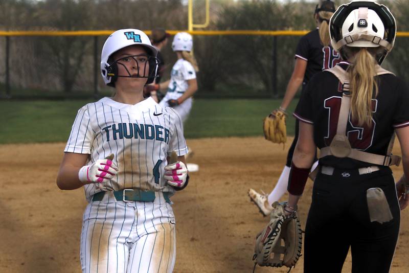 Woodstock North's Kylee Jordan scores Woodstock North’s first run during a Kishwaukee River Conference softball game against Richmond-Burton on Thursday, April 16, 2026, at Woodstock North High School.