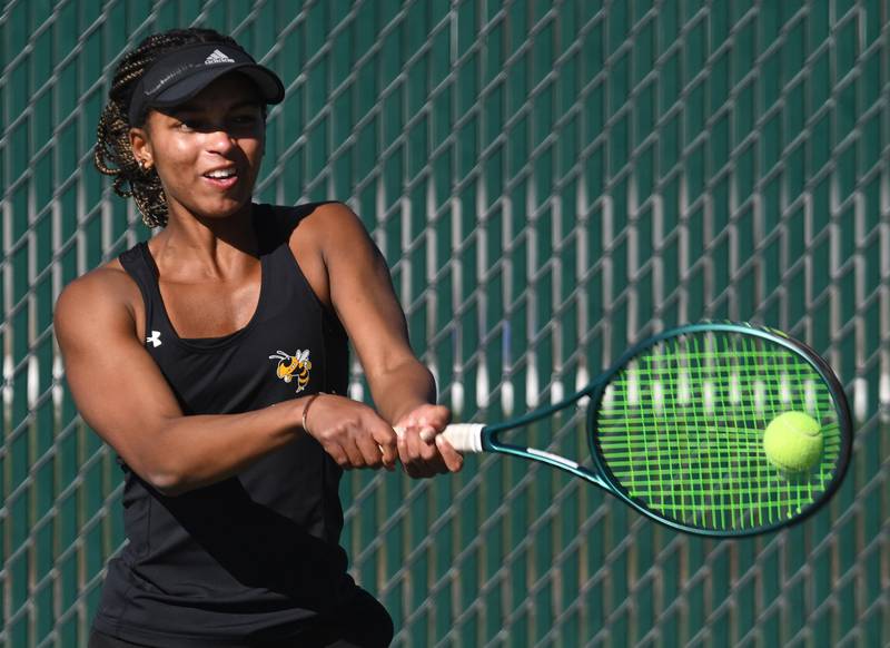 Hinsdale South’s Chloe Goins returns the ball during the Class 1A singles  championship match of the girls state tennis tournament at Hersey High School on Saturday, Oct. 26, 2024 in Arlington Heights.