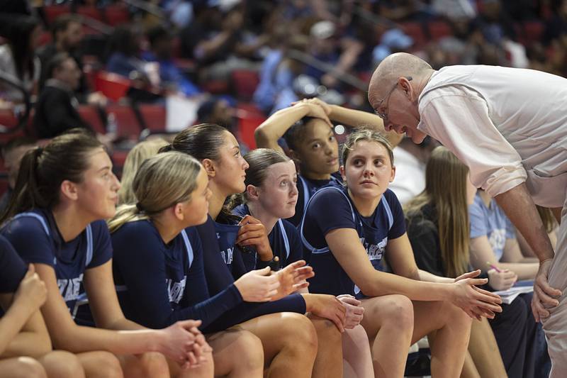 Nazareth coach Eddie Stritzel talks to his starters in the waning minutes of the Roadrunner’s win over Bellville East Friday, March 6, 2026, in the Class 4A girls state semifinal game at CEFCU Arena at ISU.