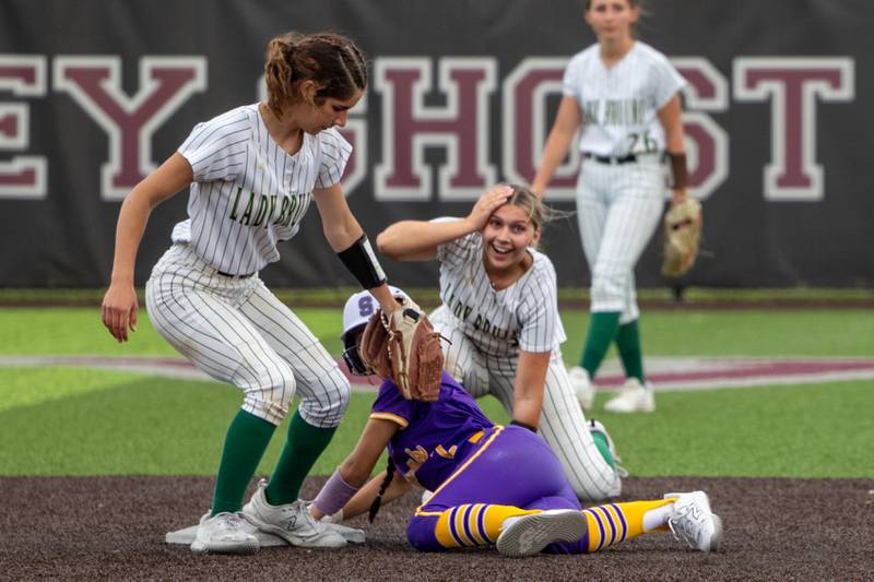 (8) Lily Bosnich of St. Bede tags out (2) Kaylee Faccio of Sherrard as (7) Maci Kelly of St. Bede expresses shock on Tuesday, May 27, 2025 at Illinois Valley Central High School in Chillicothe.