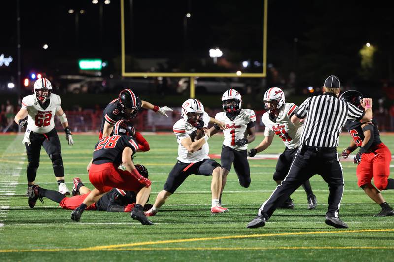 Bradley-Bourbonnais quarterback Ellis Johnson scrambles for yardage against Lincoln-Way Central during the Knight's 28-20 victory over Bradley-Bourbonnais on Friday, Oct. 3, 2025.