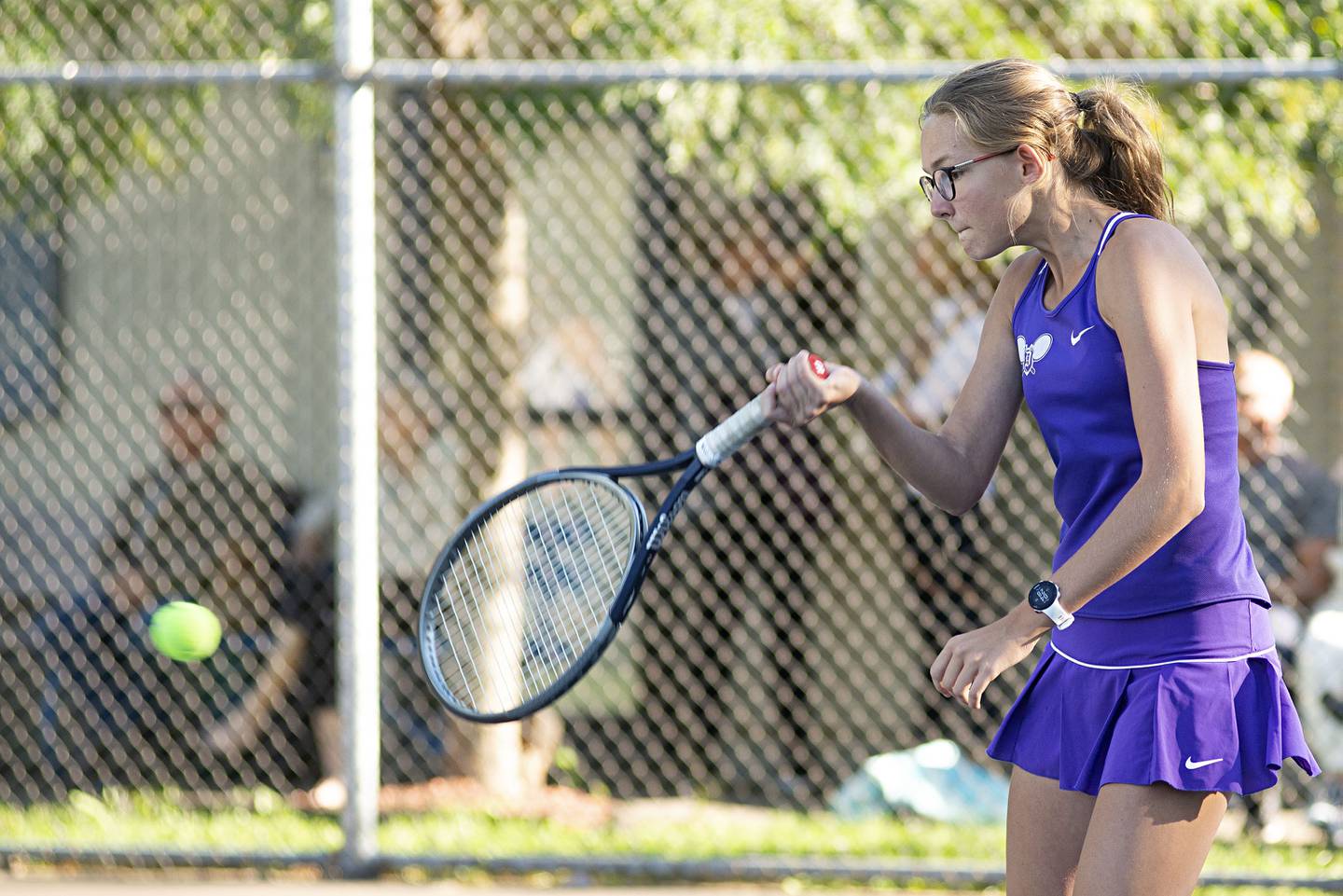 Dixon’s Grace Ferguson plays a shot Thursday, Sept. 29, 2022 while playing doubles against Sterling.