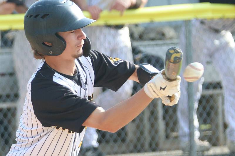 Putnam County's Jacob Furar lays down a bunt on Friday, May 8, 2026 at Putnam County High School.