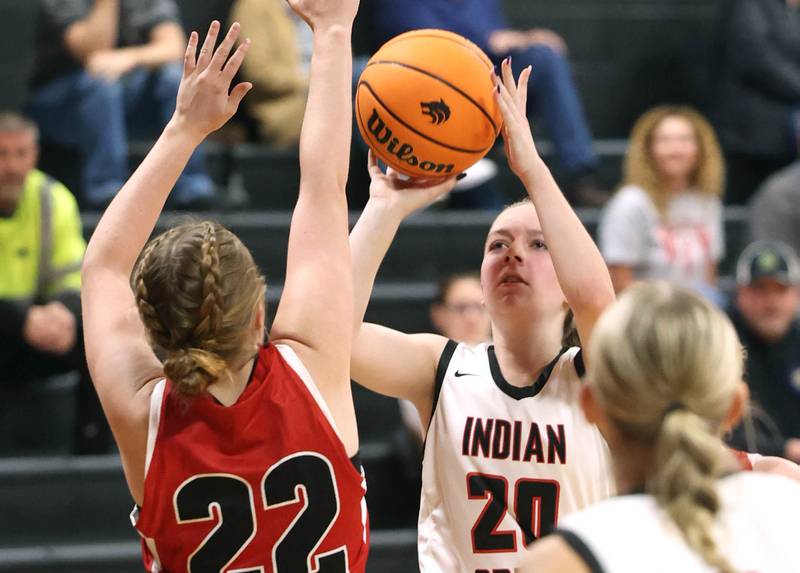 Indian Creek's Bethany Odle shoots over Aurora Christian’s Grace Kendall during their game Monday, Nov. 25, 2024, at Indian Creek High School in Shabbona.