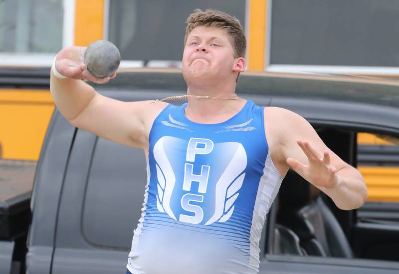 Princeton's Bennett Williams throws the shot put in Friday's TRAC Meet at Princeton.