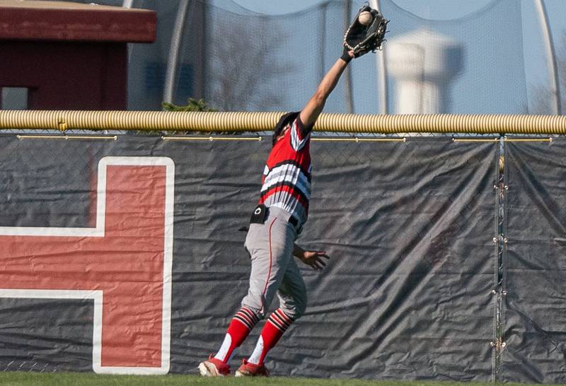 Yorkville's Isaiah Rodriguez (1) catches a deep flyball for an out against Plainfield North during a baseball game at Plainfield North High School on Thursday, April 21, 2022.