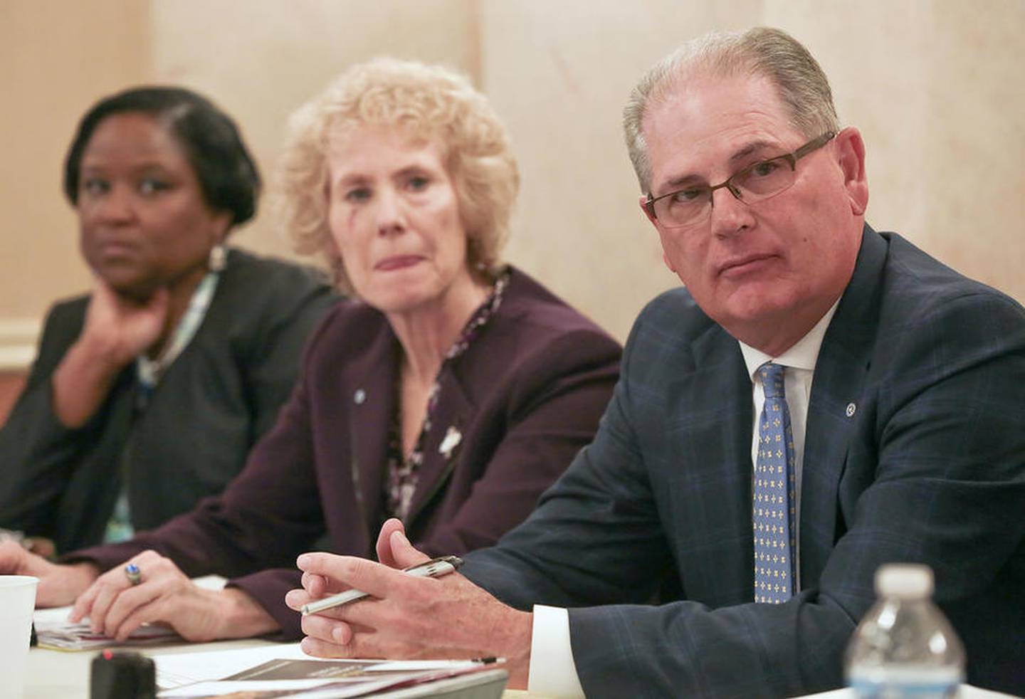 Members of the new Rialto Square Theater board meet for the first time since they were appointed by Mayor Bob O'Dekirk and Gov. Bruce Rauner on Wednesday, January 25, 2017, in Joliet, Illinois.  Robert Filotto (right), an accountant who owns Filotto Professional Services in Joliet, was elected chairman of the board.