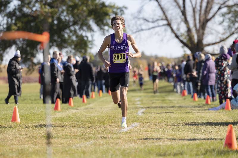 Dixon's Jacksen Ortgiesen eyes the finish line for 12th place during the Big Northern Conference cross country race at Sauk Valley College Saturday, Oct. 15, 2022.