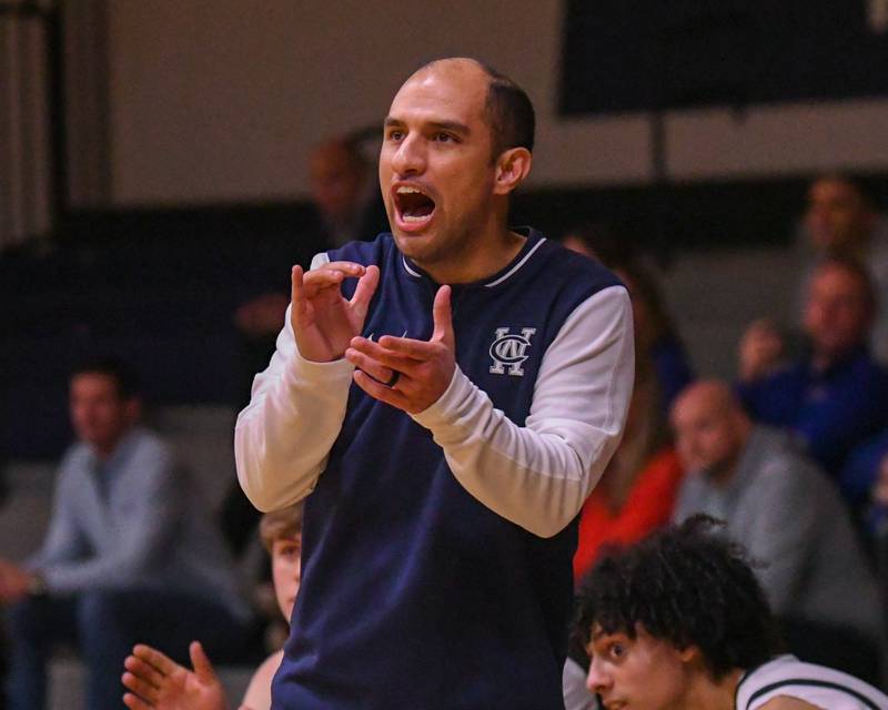 West Chicago's head coach Roy Ramos reacts to a call during the game on Friday Jan. 3, 2025, while taking on Glenbard South High School held at West Chicago High School.