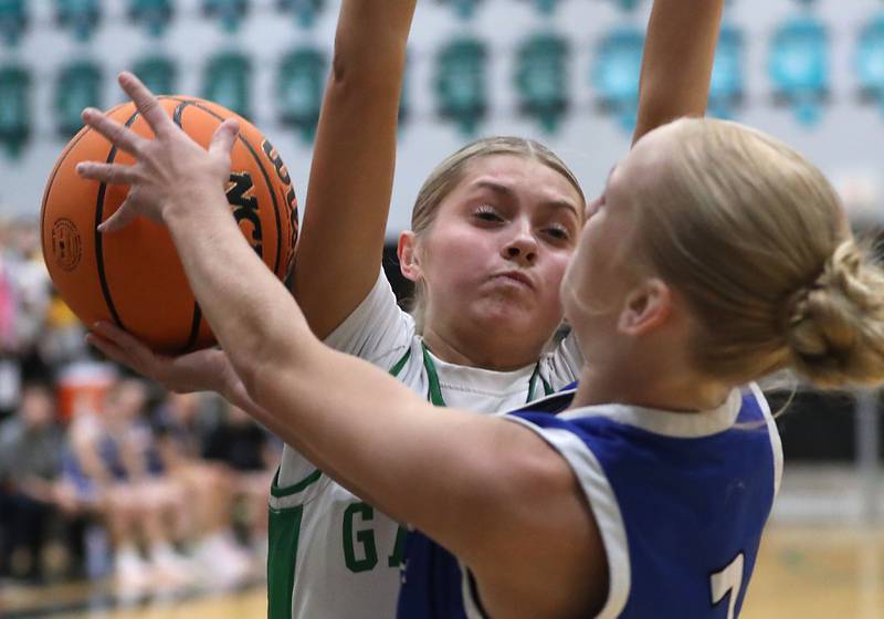 Crystal Lake South's Makena Cleary pressures Woodstock's Emma Bierman as she drive the baseline during the IHSA Class 3A Woodstock North Regional championship girls basketball game on Thursday, Feb. 19, 2026, at Woodstock North High School.