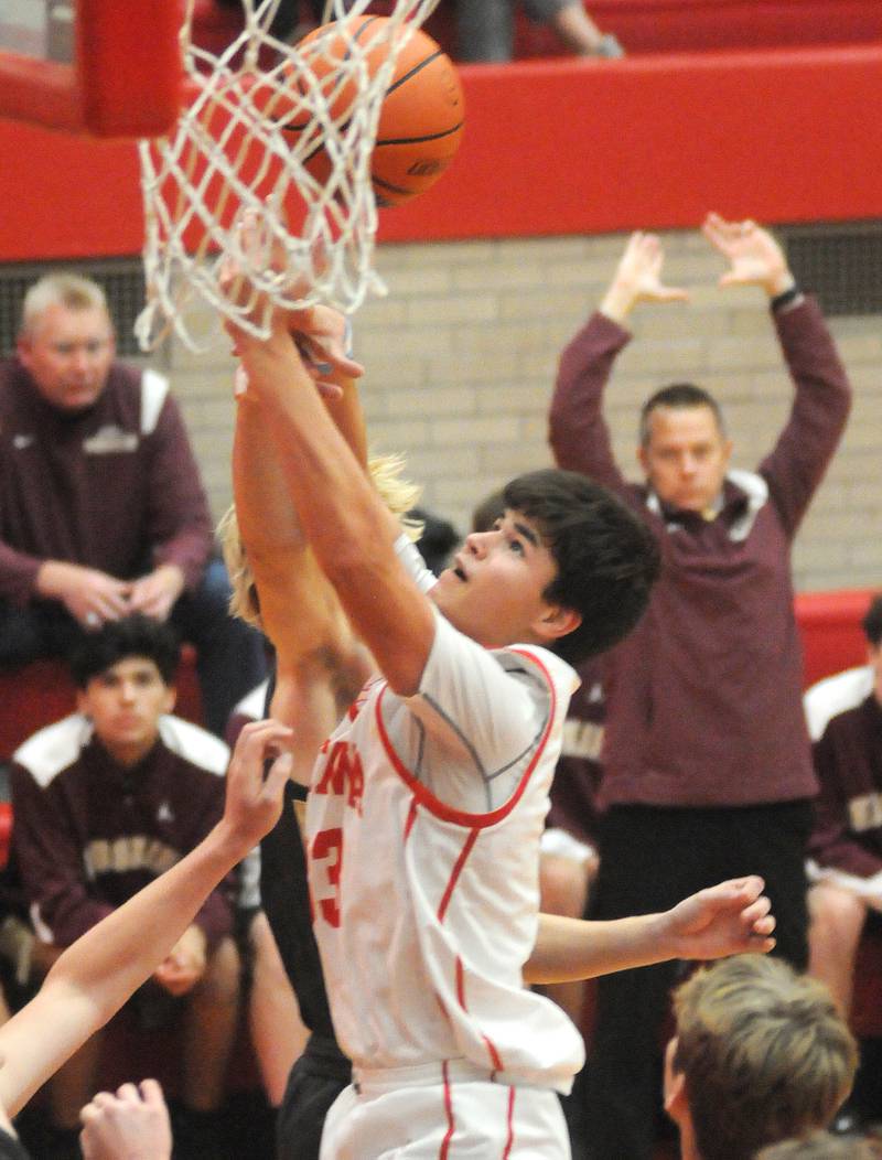 Ottawa's Cooper Knoll shoots in the game against Morris at Kingman Gym on Friday, Dec. 2, 2022 in Ottawa.