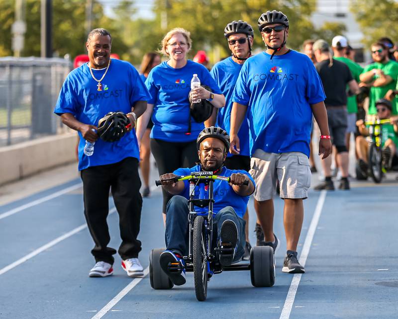 Team Comcast takes the track before the start of the Great American Big Wheel Race.  July 22nd, 2023