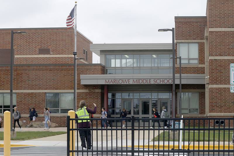 Students leave Marlowe Middle School on Thursday, Oct. 12, 2023. The Huntley Community District 158 board at its Sept. 21 meeting voiced concerns about the Secretary of State’s library grant program.