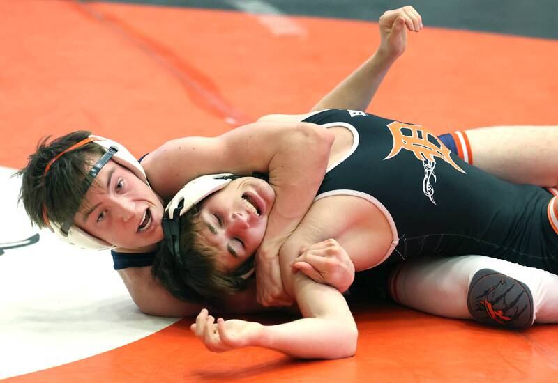 Naperville North’s Tyler Sternstein has control of DeKalb’s Ethan Schultz in their 126 pound semifinal match Friday, Jan. 20, 2023, during the DuPage Valley Conference wrestling tournament at DeKalb High School.