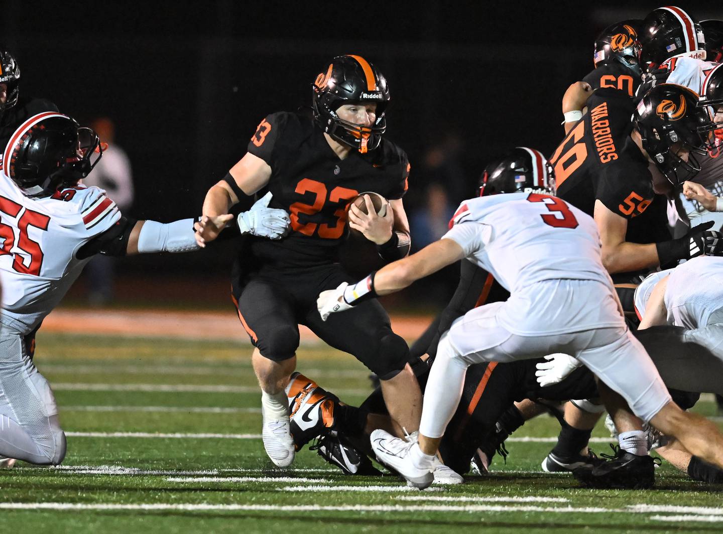 Lincoln-Way West's Jimmy Talley Jr. (23) rushes the ball against Lincoln-Way Central on Friday, Sept. 19, 2025, in New Lenox.
