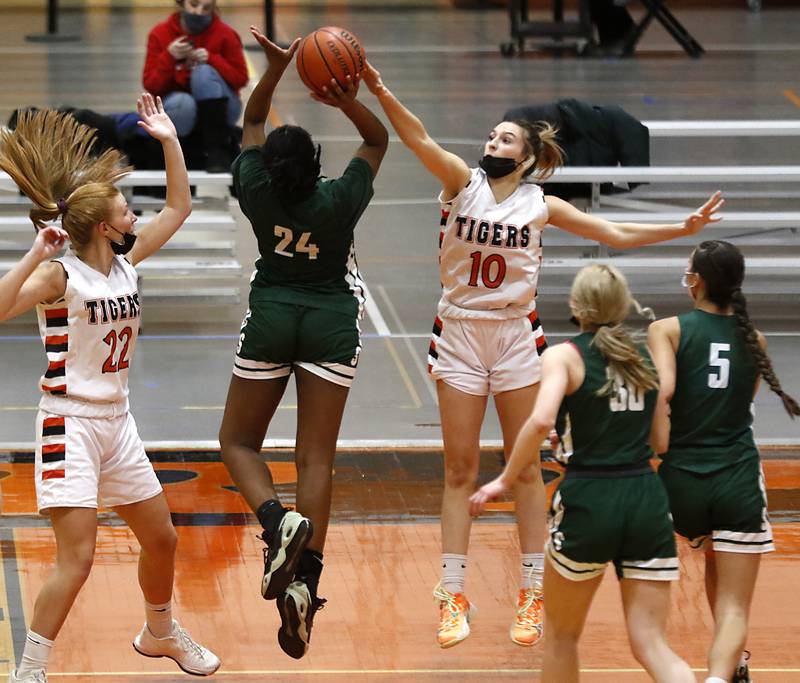 Crystal Lake Central's Isabelle Szela blocks the shot of Crystal Lake South's Kree Nunnally during a Fox Valley Conference game Wednesday, Jan. 26, 2022, between Crystal Lake South and Crystal Lake Central at Crystal Lake Central High School.