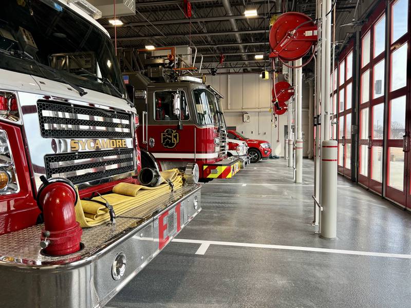 Fire trucks and emergency vehicles sit in the new garage on Tuesday, Feb. 17, 2026, at the Sycamore Fire Department's new fire station, 1351 S. Prairie Drive.  The station will replace the aging building at 535 DeKalb Ave. The department held a ceremony Tuesday to mark the opening.