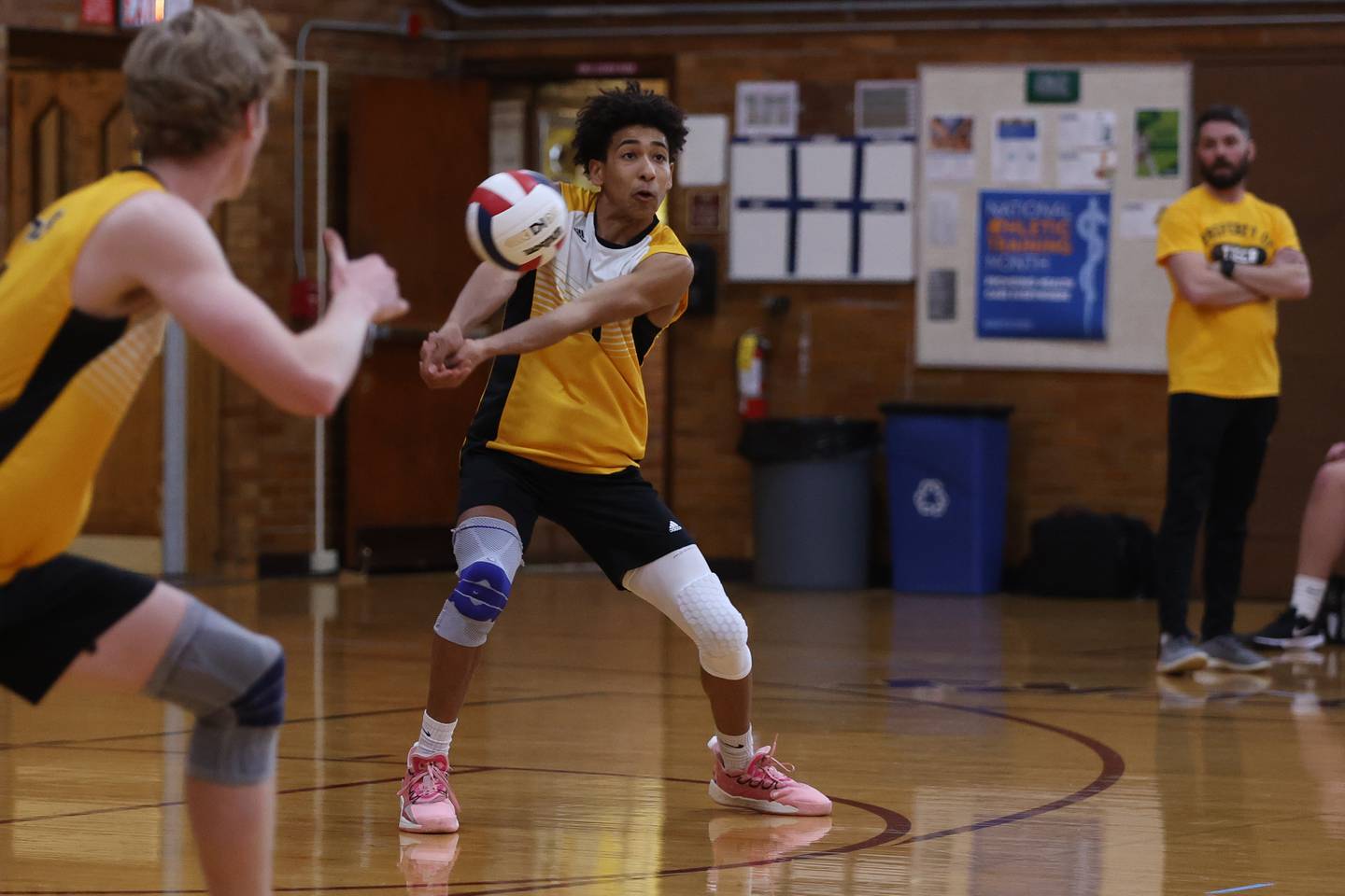 Joliet West’s Ben Castillo makes a dig against Lockport. Tuesday, Mar. 29, 2022, in Lockport.