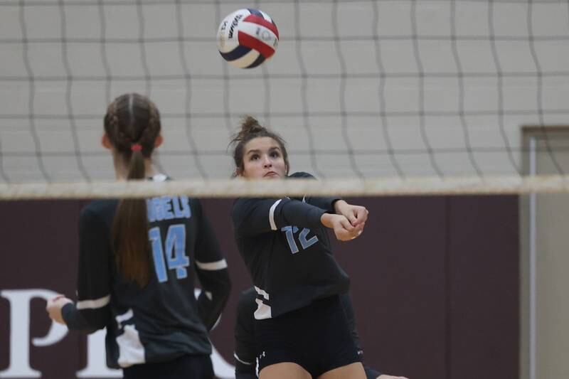 Joliet Catholic’s Ellie Blotnik digs out a serve against Nazareth on Tuesday, October 11th in Joliet.